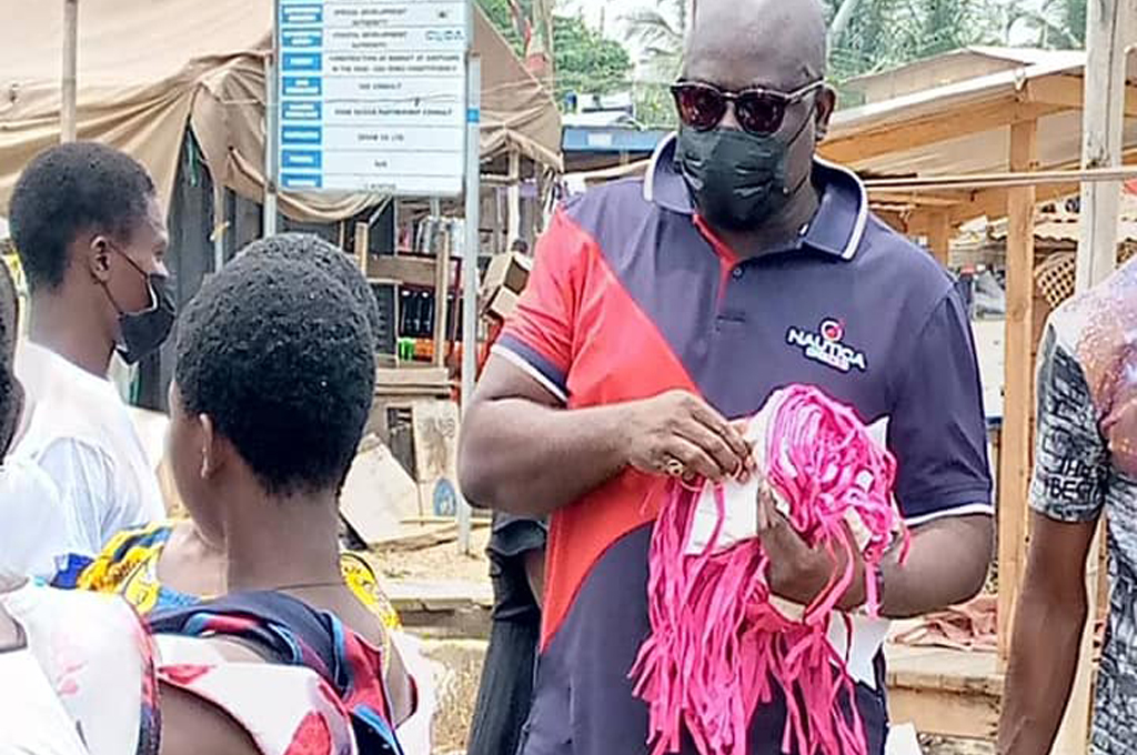Shai-Osudoku DCE Donates Facemask, Sanitizers to Asutuare Market Women.