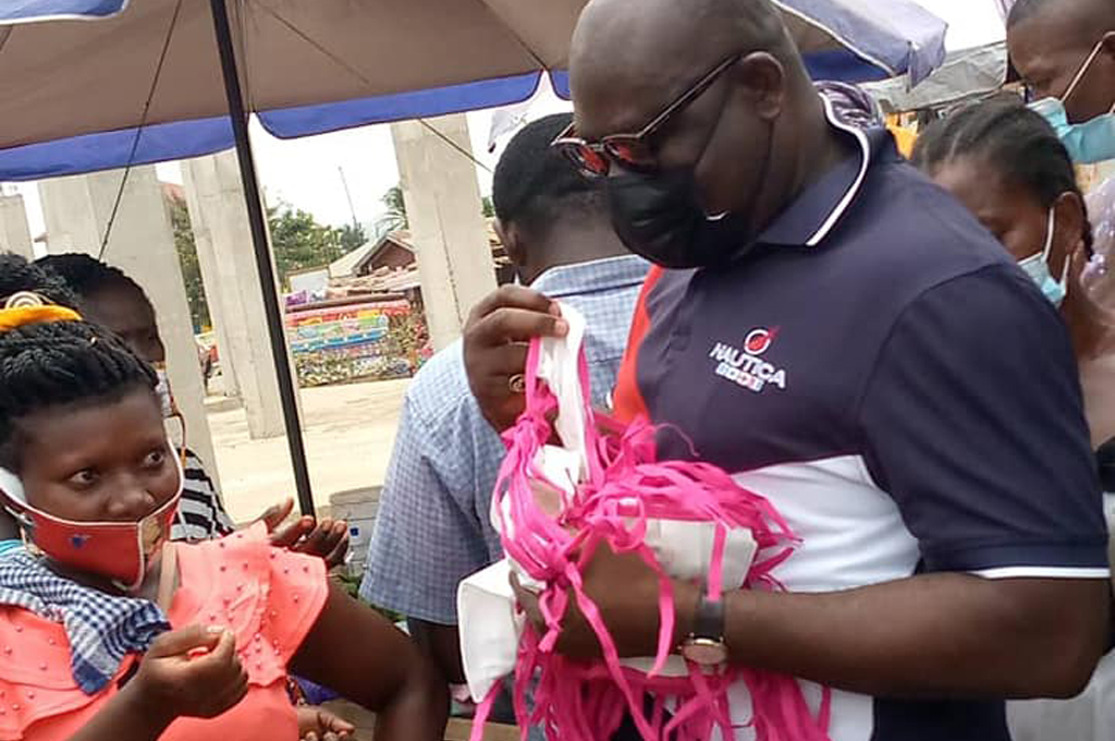 Shai-Osudoku DCE Donates Facemask, Sanitizers to Asutuare Market Women.