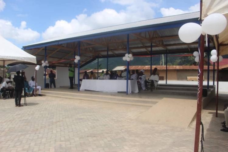 DCE COMMISSIONS COMMUNITY CENTRE AT AYIKUMA.
